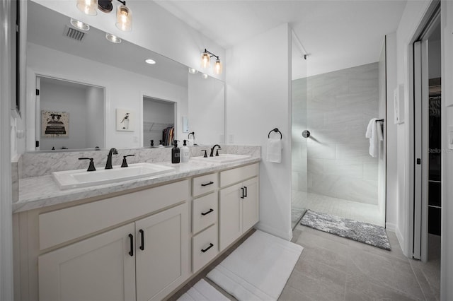 4451 Elijah Loop, The Villages, FL 32163 - full bath featuring a spacious closet, double vanity, walk in shower, and recessed lighting