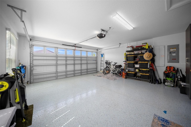 4451 Elijah Loop, The Villages, FL 32163 - garage with electric panel and a garage door opener