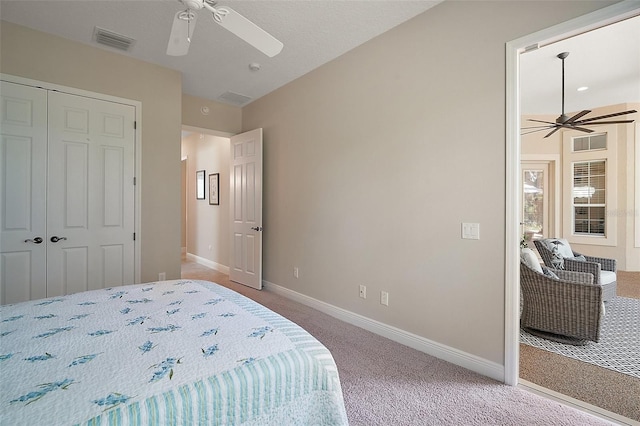 2204 Baypoint Way, The Villages, FL 32162 - bedroom featuring carpet flooring, baseboards, ceiling fan, and a closet