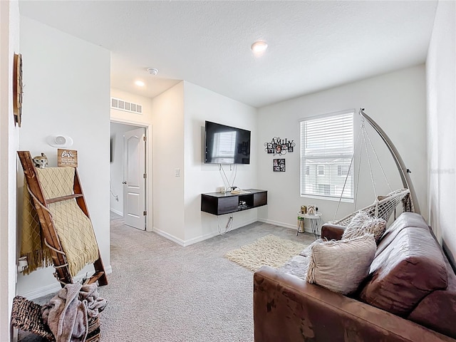 1042 Lido Dr, Howey In The Hills, FL 34737 - living room with light colored carpet, baseboards, and recessed lighting