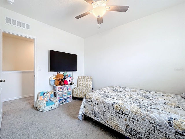 1042 Lido Dr, Howey In The Hills, FL 34737 - carpeted bedroom with ceiling fan and baseboards