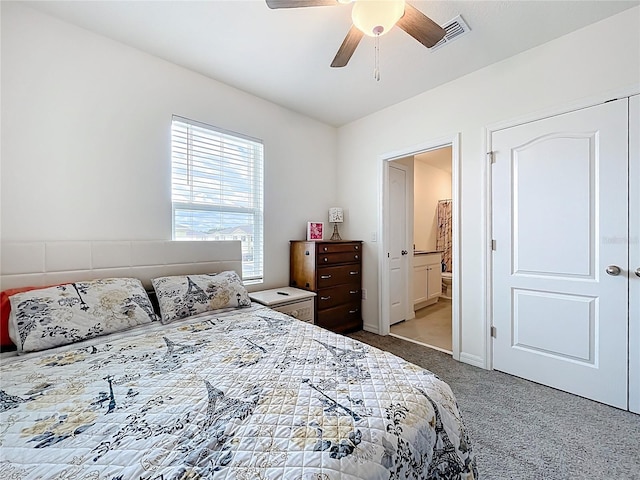 1042 Lido Dr, Howey In The Hills, FL 34737 - bedroom featuring carpet floors, ensuite bathroom, and ceiling fan