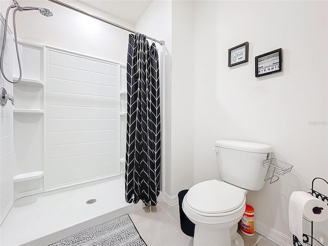 1042 Lido Dr, Howey In The Hills, FL 34737 - full bathroom featuring a stall shower, tile patterned floors, and baseboards