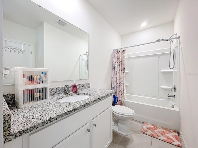 1042 Lido Dr, Howey In The Hills, FL 34737 - full bathroom with tile patterned floors, shower / bath combo with shower curtain, toilet, and vanity
