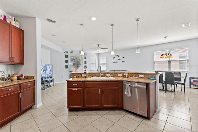 4869 Grassendale Ter, Sanford, FL 32771 - kitchen featuring a sink, dishwasher, decorative light fixtures, and light stone counters