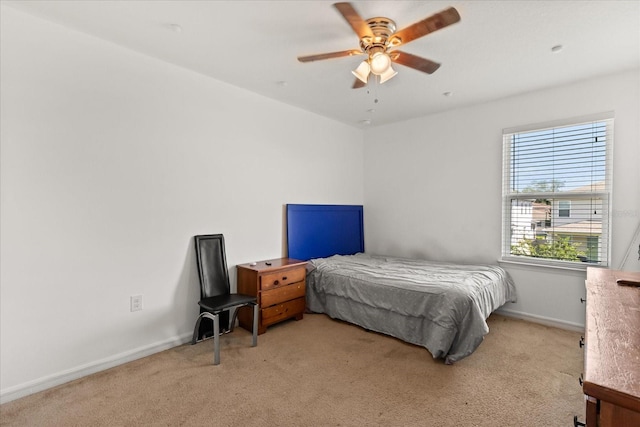 4869 Grassendale Ter, Sanford, FL 32771 - bedroom with light colored carpet, baseboards, and a ceiling fan