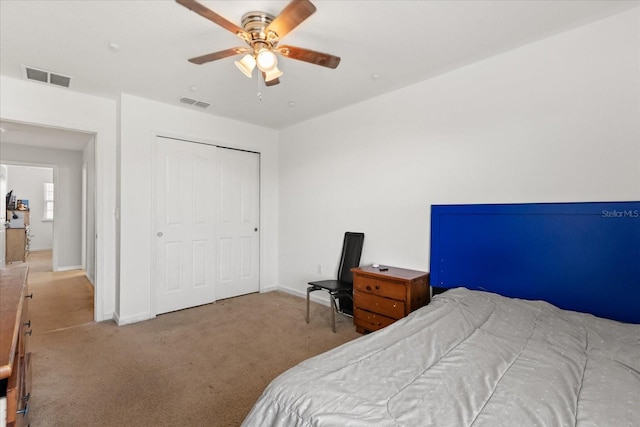 4869 Grassendale Ter, Sanford, FL 32771 - bedroom with carpet, a closet, baseboards, and a ceiling fan