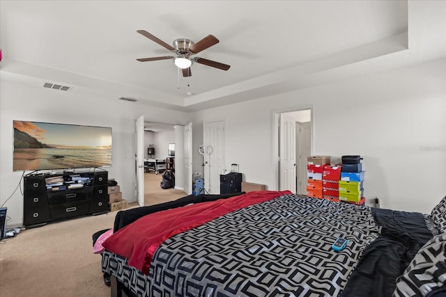 4869 Grassendale Ter, Sanford, FL 32771 - carpeted bedroom with a raised ceiling and ceiling fan