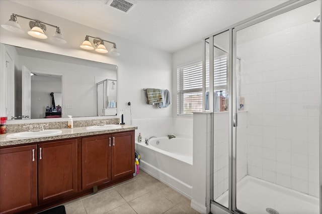 4869 Grassendale Ter, Sanford, FL 32771 - bathroom with tile patterned floors, a shower stall, a bath, and double vanity