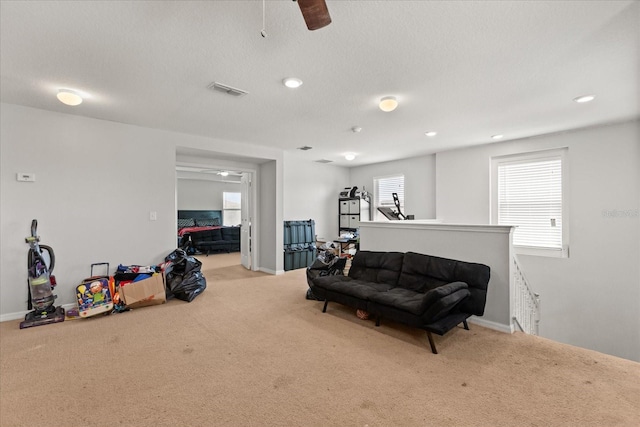 4869 Grassendale Ter, Sanford, FL 32771 - living room featuring ceiling fan, carpet, recessed lighting, and baseboards