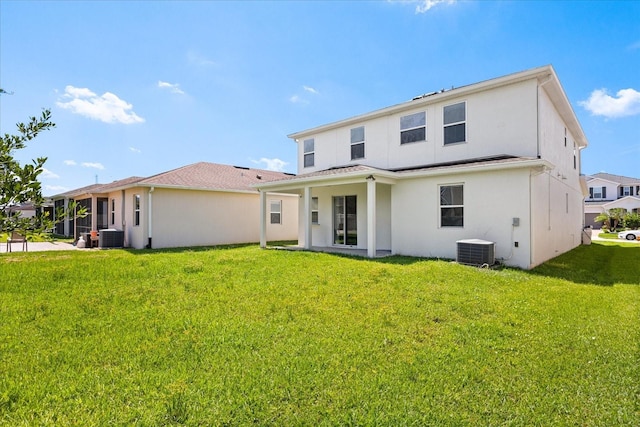 4869 Grassendale Ter, Sanford, FL 32771 - rear view of house featuring central AC unit, stucco siding, and a yard