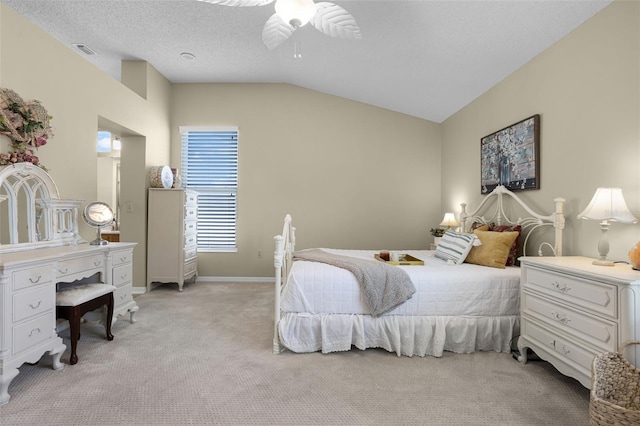 815 Cortez Ave, The Villages, FL 32159 - bedroom featuring vaulted ceiling, light carpet, and ceiling fan