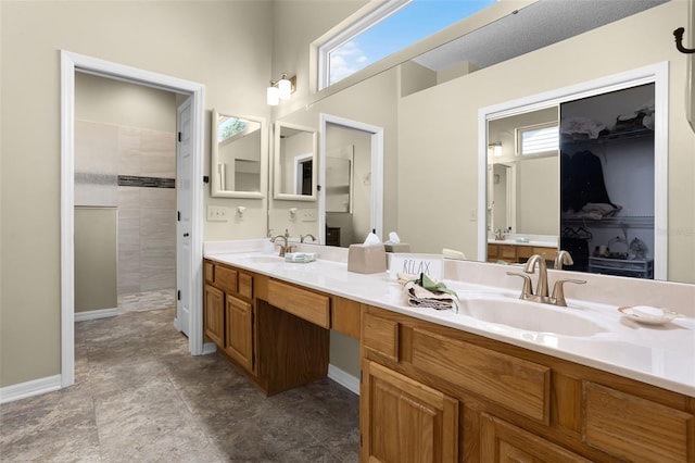 815 Cortez Ave, The Villages, FL 32159 - full bath with double vanity, plenty of natural light, and a tile shower