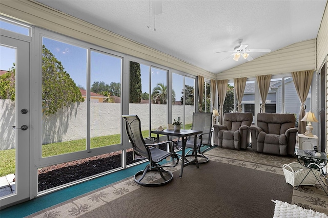 815 Cortez Ave, The Villages, FL 32159 - sunroom featuring ceiling fan, lofted ceiling, outdoor dining space, and a textured ceiling