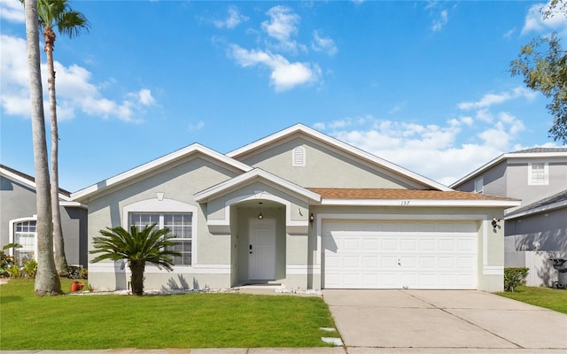 ranch-style house featuring stucco siding, concrete driveway, a front yard, and an attached garage