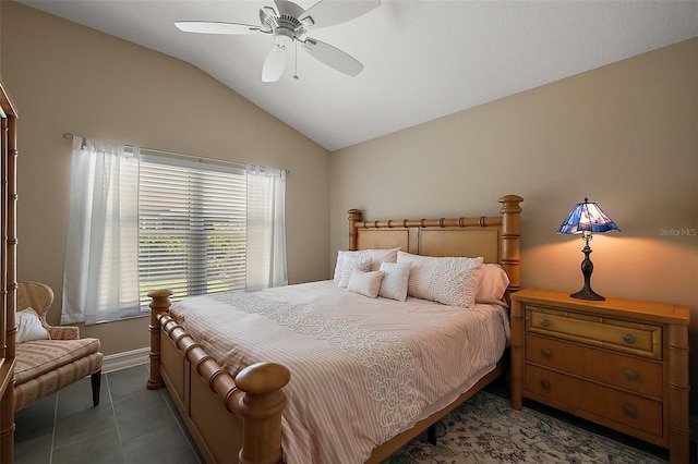 6243 Danielson Loop, The Villages, FL 32163 - tiled bedroom featuring vaulted ceiling, a ceiling fan, and baseboards