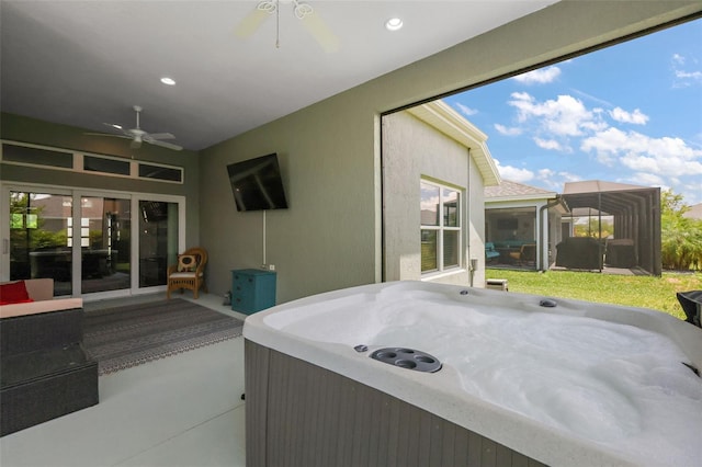 6243 Danielson Loop, The Villages, FL 32163 - view of patio / terrace featuring a hot tub and a ceiling fan