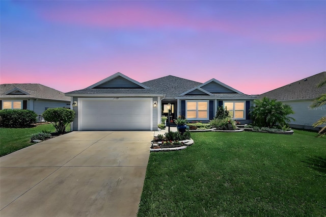 11287 Stewart Loop, Oxford, FL 34484 - ranch-style house featuring an attached garage, driveway, a front yard, and roof with shingles