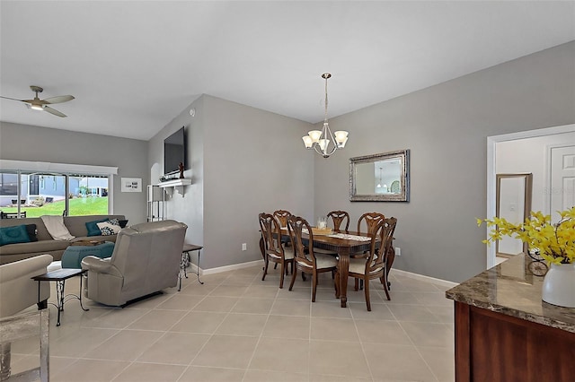 11287 Stewart Loop, Oxford, FL 34484 - dining space featuring baseboards, ceiling fan, a chandelier, and light tile patterned floors