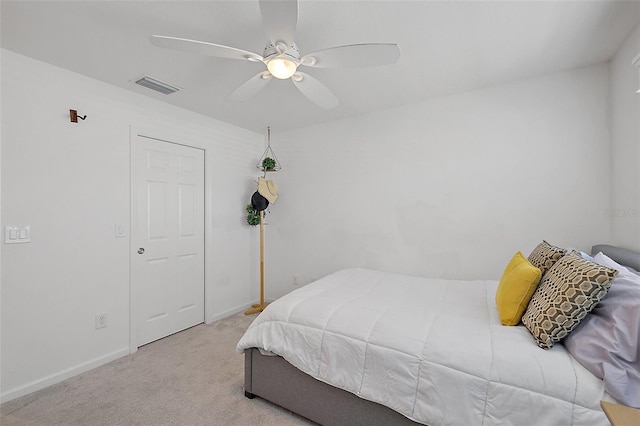 11287 Stewart Loop, Oxford, FL 34484 - carpeted bedroom with baseboards and ceiling fan