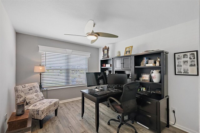 11287 Stewart Loop, Oxford, FL 34484 - office space with baseboards, a ceiling fan, and wood finished floors