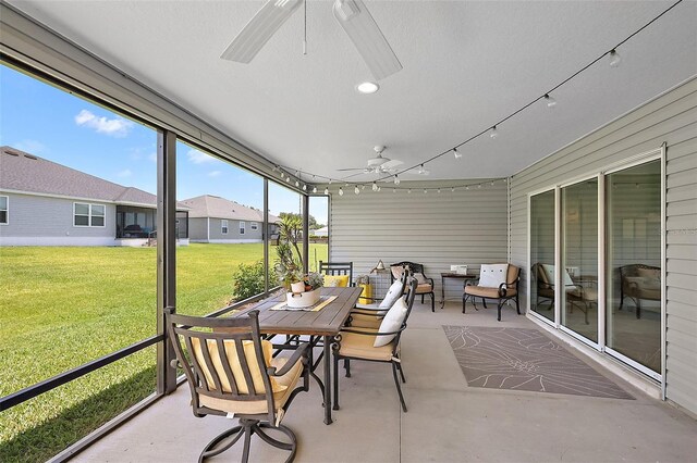 11287 Stewart Loop, Oxford, FL 34484 - sunroom featuring a ceiling fan and outdoor dining area