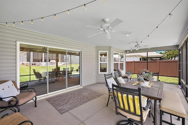 11287 Stewart Loop, Oxford, FL 34484 - sunroom featuring a ceiling fan and outdoor dining space