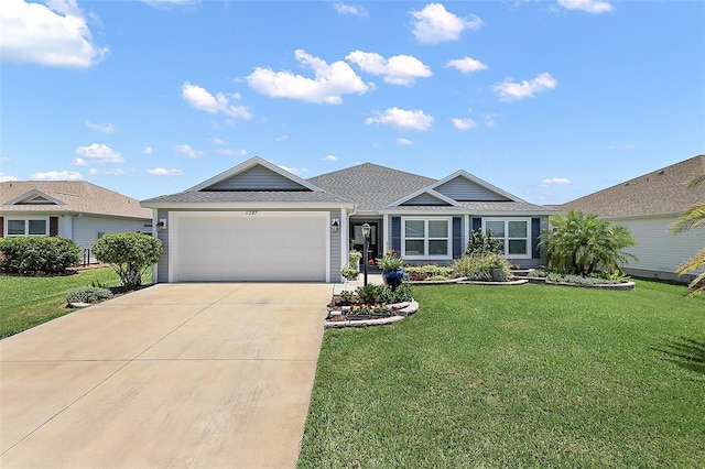 11287 Stewart Loop, Oxford, FL 34484 - single story home featuring an attached garage, concrete driveway, a front yard, and roof with shingles