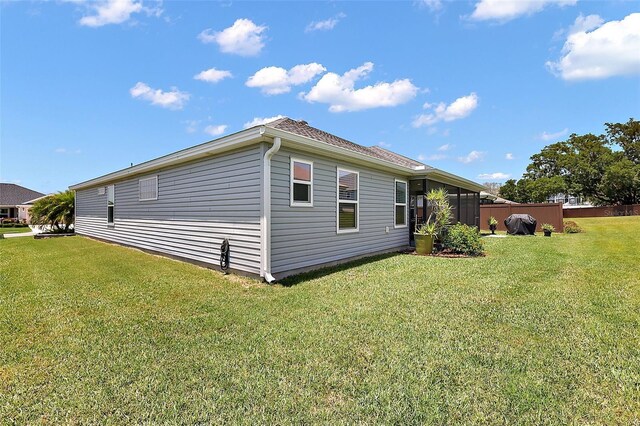 11287 Stewart Loop, Oxford, FL 34484 - view of property exterior featuring a lawn