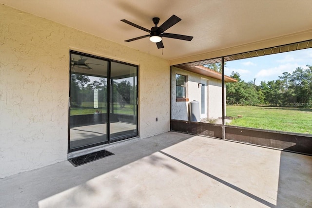 10655 N Party Ave, Dunnellon, FL 34433 - unfurnished sunroom with a ceiling fan