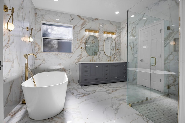 full bathroom with marble tiled flooring, a marble finish shower, a soaking tub, vanity, and recessed lighting