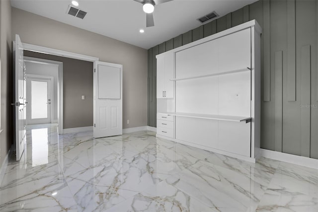 unfurnished bedroom with light marble finish floors, baseboards, recessed lighting, a ceiling fan, and a closet