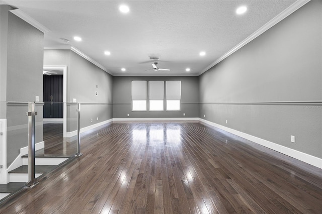 spare room featuring crown molding, ceiling fan, wood-type flooring, baseboards, and recessed lighting