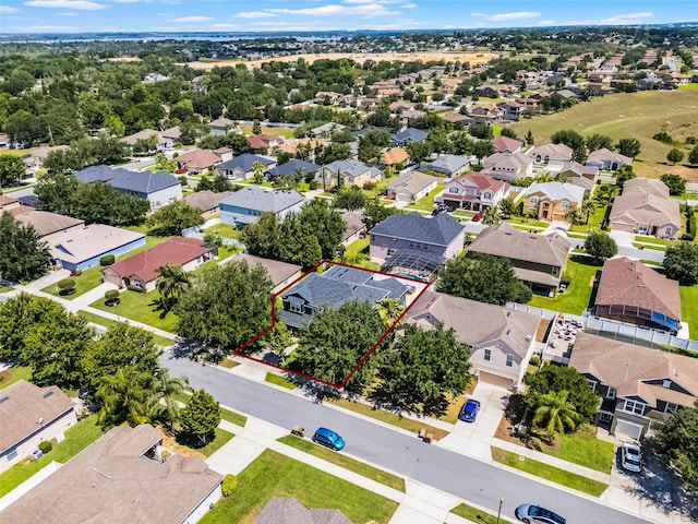 aerial view of residential area with property boundaries highlighted