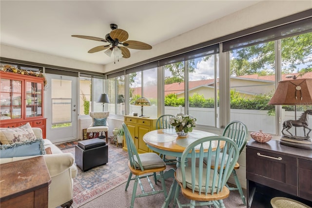 sunroom / solarium featuring healthy amount of natural light