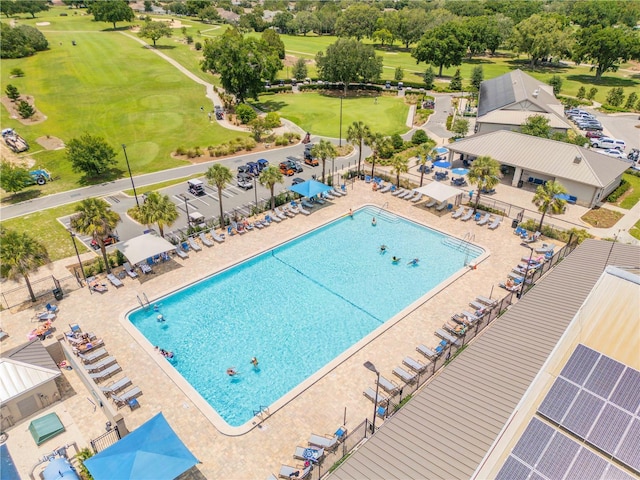 community pool with view of golf course