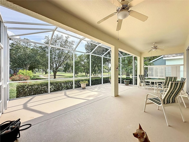 2415 Twickingham Ct, Clermont, FL 34711 - unfurnished sunroom featuring a ceiling fan and healthy amount of natural light