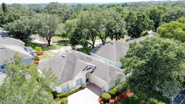 2415 Twickingham Ct, Clermont, FL 34711 - view of subject property featuring a heavily wooded area
