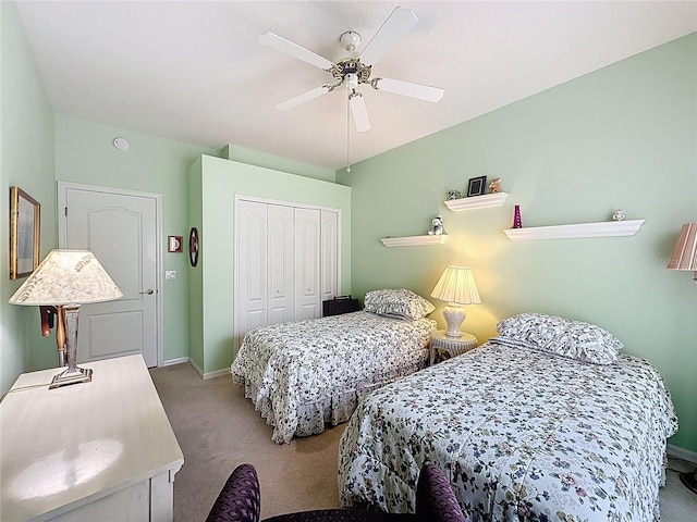 2415 Twickingham Ct, Clermont, FL 34711 - bedroom featuring carpet, a closet, ceiling fan, and baseboards