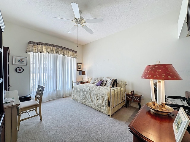 2415 Twickingham Ct, Clermont, FL 34711 - carpeted bedroom featuring a textured ceiling and ceiling fan