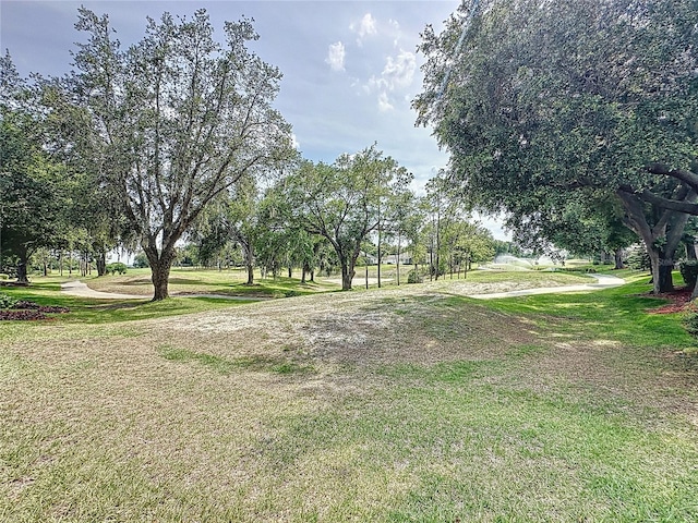 2415 Twickingham Ct, Clermont, FL 34711 - view of community with a lawn
