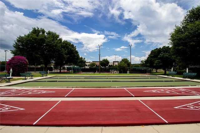 2415 Twickingham Ct, Clermont, FL 34711 - view of home's community with shuffleboard