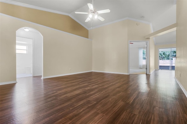 8527 Firestone Cir, Clermont, FL 34711 - unfurnished room featuring ceiling fan, arched walkways, dark wood finished floors, high vaulted ceiling, and baseboards