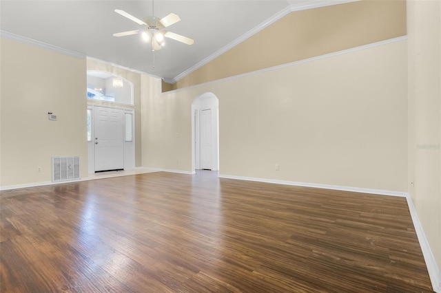 8527 Firestone Cir, Clermont, FL 34711 - unfurnished room featuring arched walkways, ceiling fan, high vaulted ceiling, dark wood-style floors, and baseboards