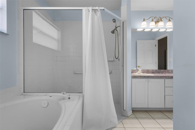 8527 Firestone Cir, Clermont, FL 34711 - bathroom featuring a bathtub, tiled shower, vanity, and tile patterned flooring