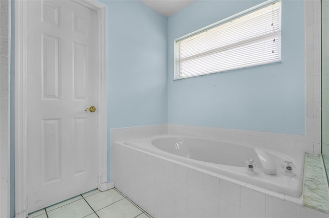 8527 Firestone Cir, Clermont, FL 34711 - full bathroom featuring a garden tub and tile patterned floors