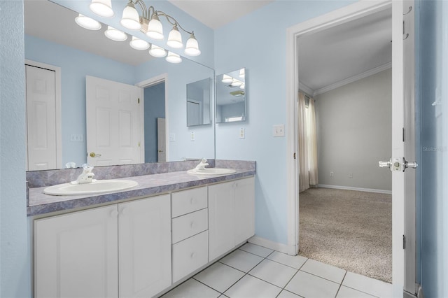 8527 Firestone Cir, Clermont, FL 34711 - full bathroom with tile patterned flooring, double vanity, baseboards, and ornamental molding