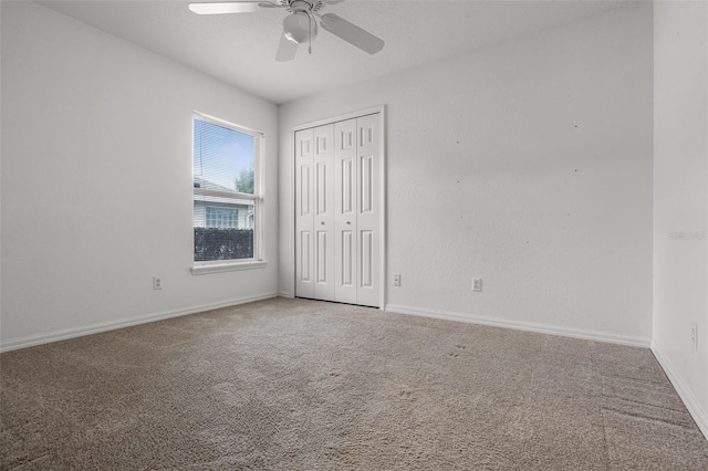 8527 Firestone Cir, Clermont, FL 34711 - unfurnished bedroom with carpet, a closet, and baseboards