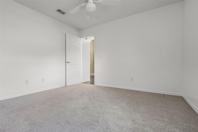 8527 Firestone Cir, Clermont, FL 34711 - carpeted empty room with ceiling fan, baseboards, and arched walkways