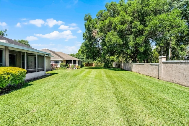 8527 Firestone Cir, Clermont, FL 34711 - view of yard featuring a sunroom